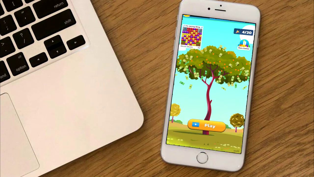 Gameplay screenshot from Bitcoin Pop, showing colored Bitcoin balls being matched and cleared in a classic puzzle layout.